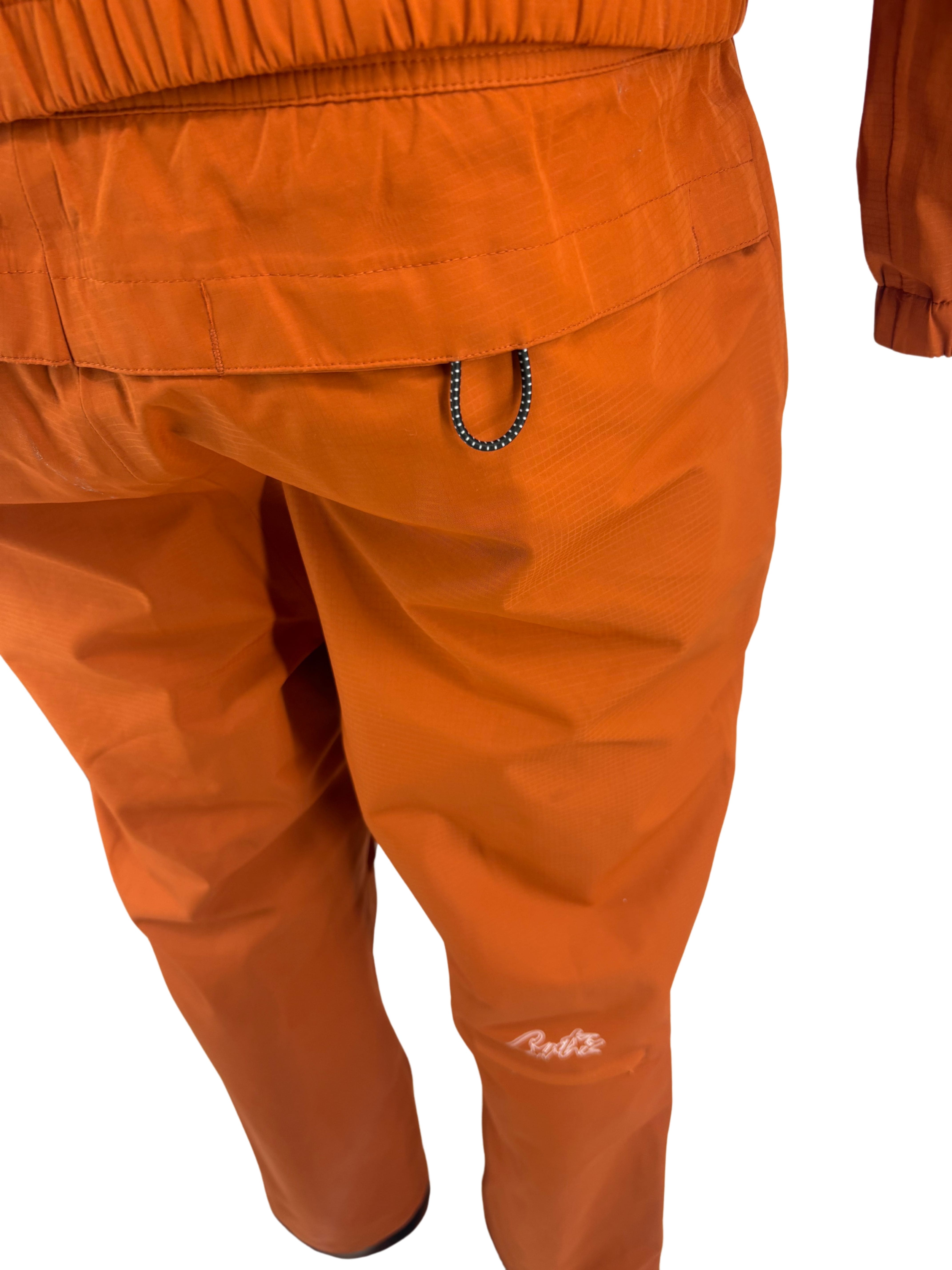 Corteiz Gutta Waterproof Jacket & Bottoms - Orange