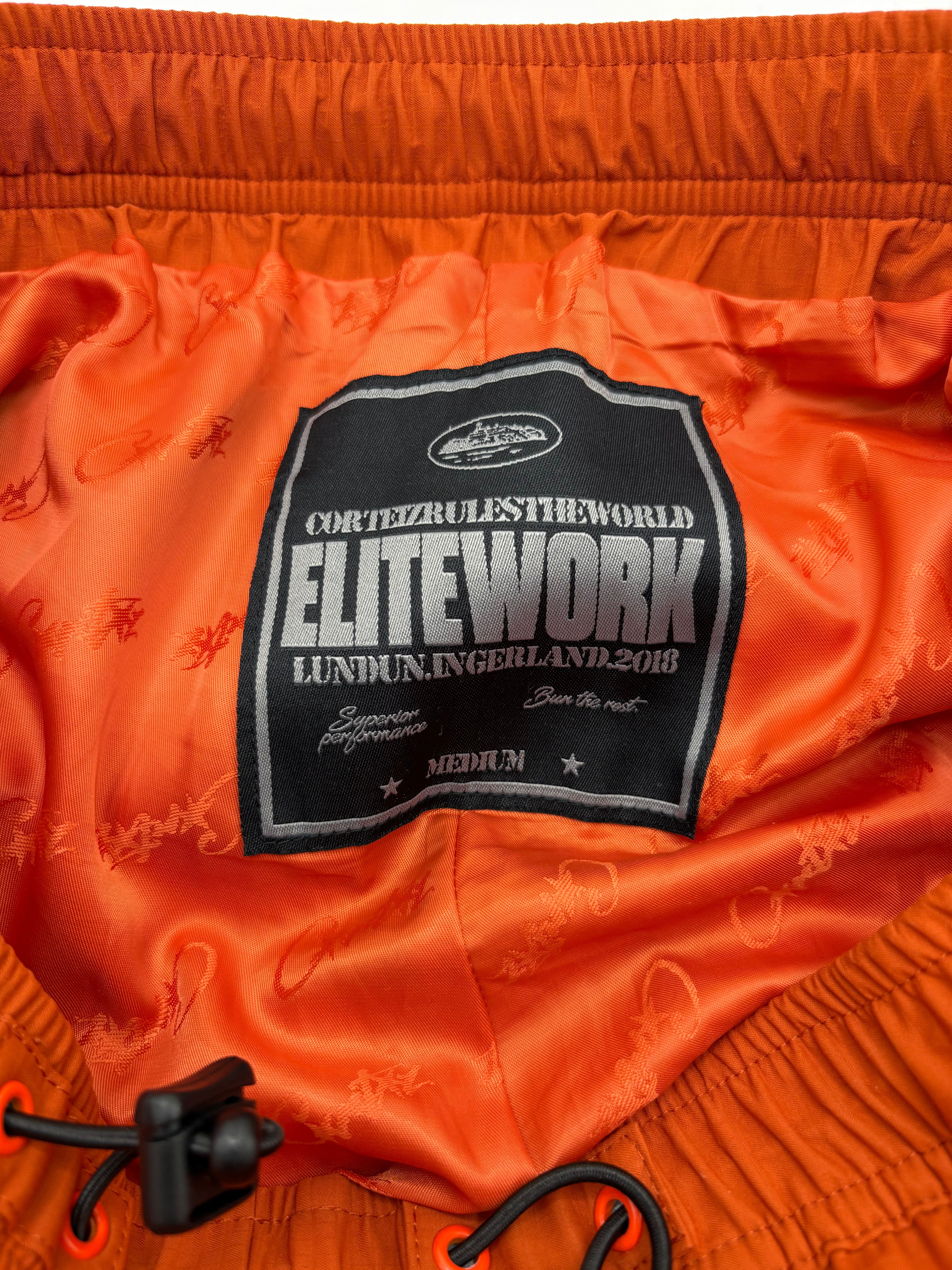 Corteiz Gutta Waterproof Jacket & Bottoms - Orange