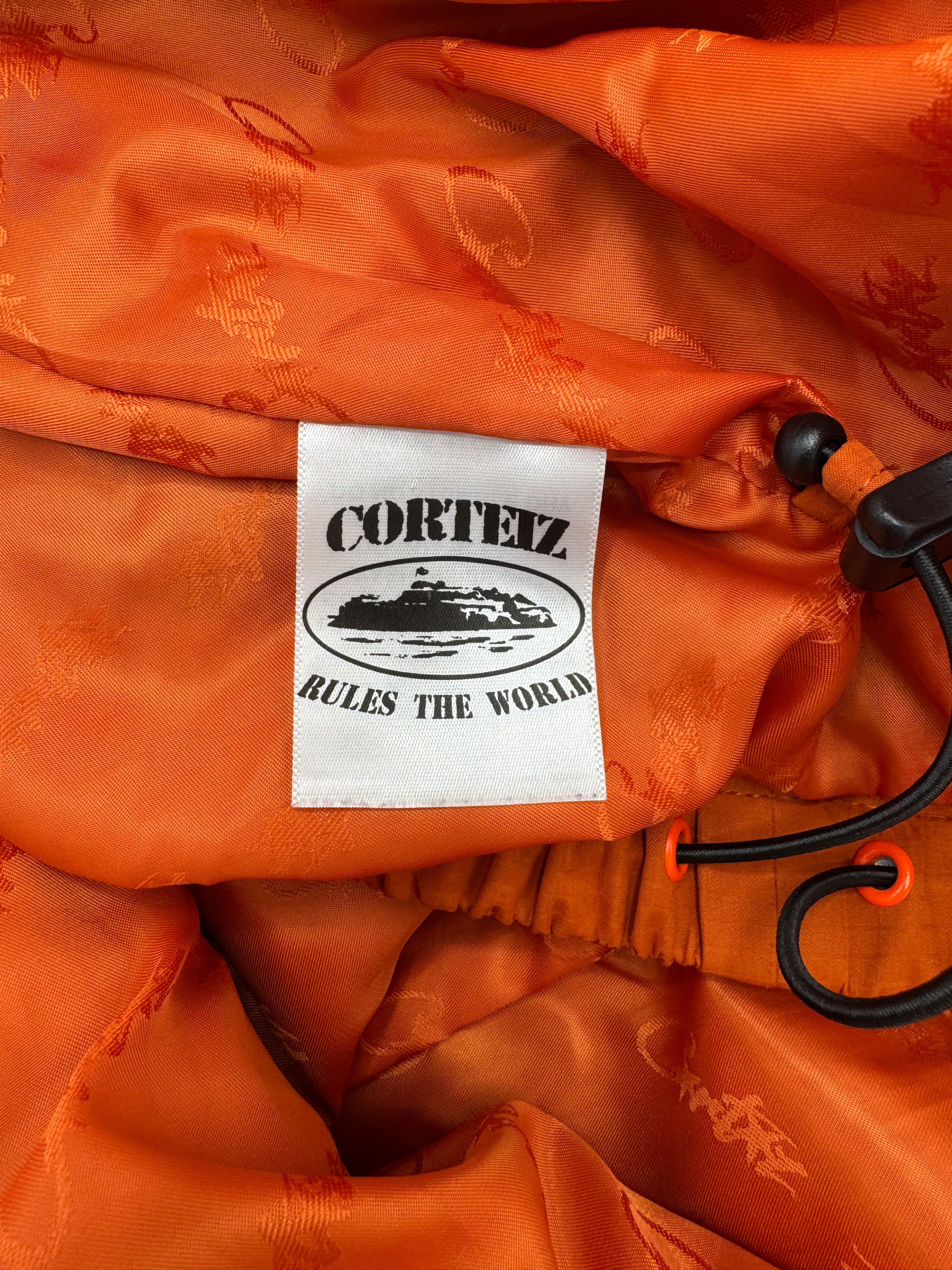 Corteiz Gutta Waterproof Jacket & Bottoms - Orange