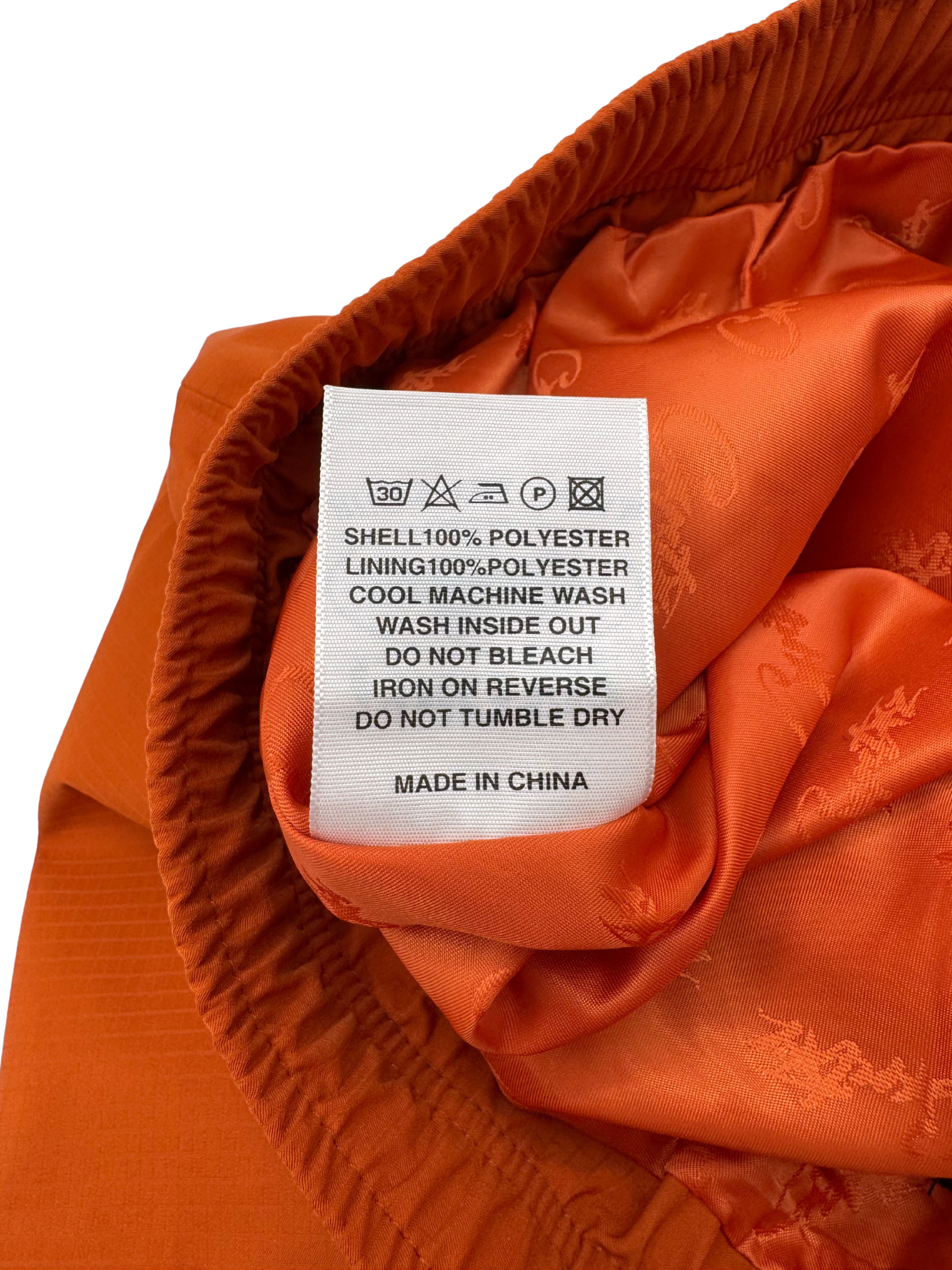 Corteiz Gutta Waterproof Jacket & Bottoms - Orange