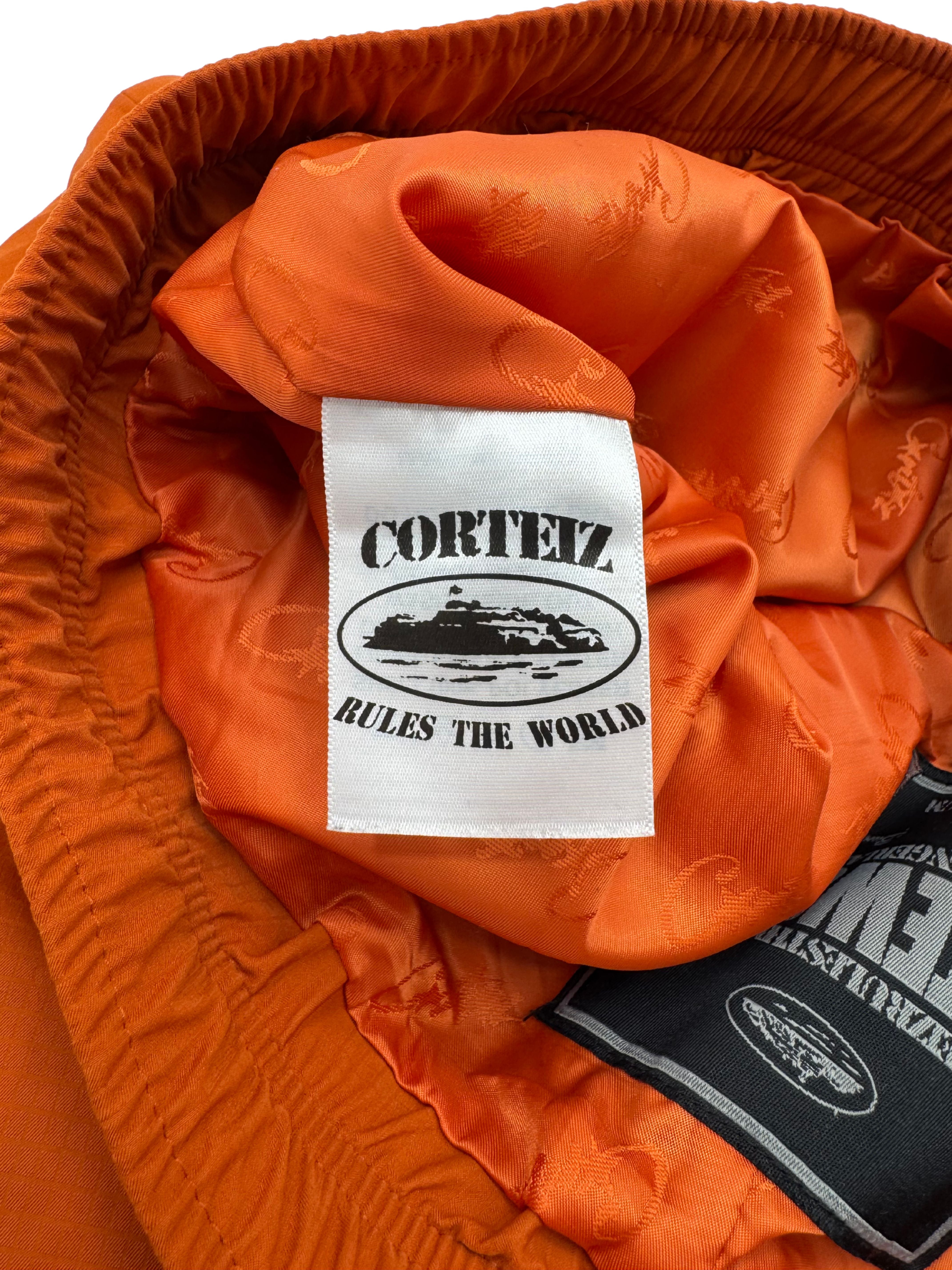 Corteiz Gutta Waterproof Jacket & Bottoms - Orange
